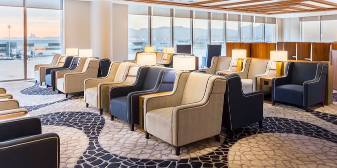 The seating area in the Plaza Premium Lounge at Rio de Janeiro Airport offers comfortable armchairs with views of the tarmac.