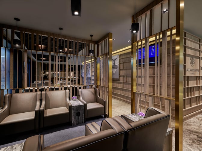 The Plaza Premium Lounge at Langkawi International Airport features comfortable seating areas with partitioned sections for privacy and relaxation.