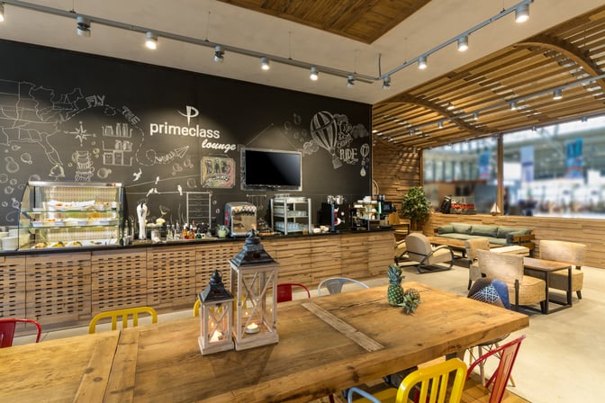 The Primeclass Lounge (Domestic) at Milas–Bodrum Airport features a self-serve food and beverage station with seating areas for relaxation.