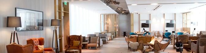 The seating area in the Star Alliance Lounge Buenos Aires offers a variety of chairs and sofas for travelers to relax.