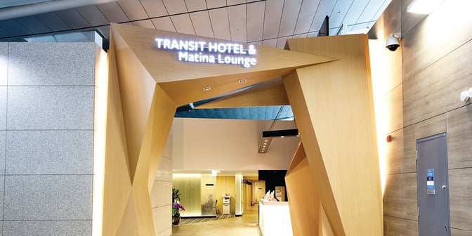 The entrance to the Transit Hotel & Matina Lounge at Seoul Incheon Airport features a reception desk and modern architectural design.