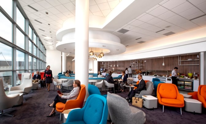 The Air France/KLM Lounge at Washington Dulles International Airport features varied seating options and a self-serve food and beverage area.