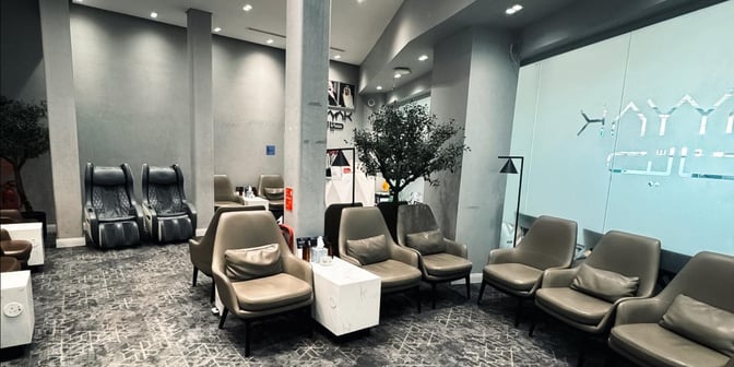 The Hayyak Lounge at King Saud Domestic Airport features comfortable seating and massage chairs, providing a relaxing space for travelers.