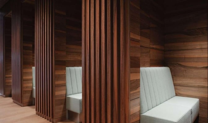 Semi-private booth seating at Lounge Tegel in Berlin Brandenburg International Airport offers a quiet space for travelers.