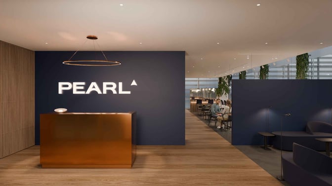 The entrance to the Pearl Lounge at Bratislava International Airport features a reception desk and seating area for guests.