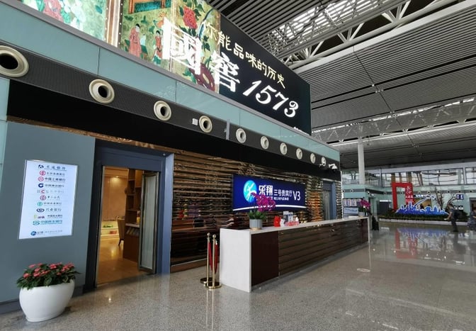The Joyflight No. 3 VIP Lounge entrance at Changsha Huanghua International Airport features a reception desk and visible signage for various services.