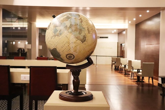 The Earth Lounge at Cochin International Airport offers a spacious and serene atmosphere with comfortable seating ideal for relaxation. Travelers can enjoy a variety of amenities in a stylish setting, enhancing their overall travel experience