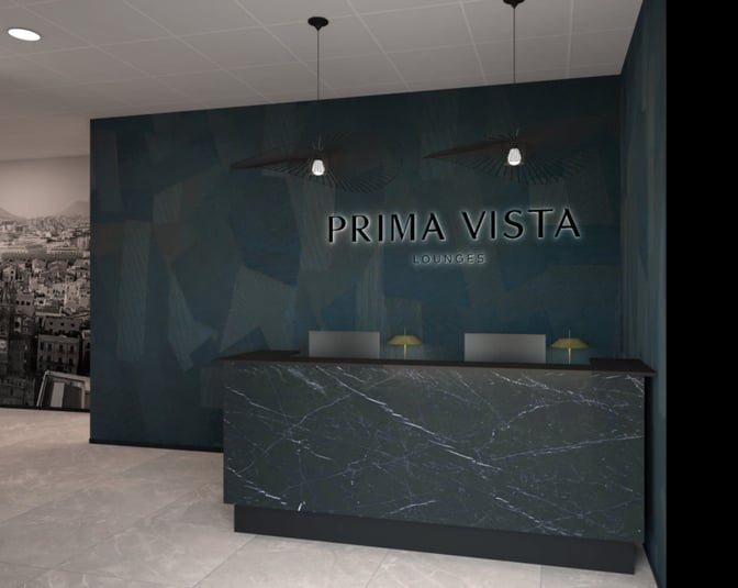 The Prima Vista Lounge entrance at Falcone–Borsellino International Airport features a reception desk with signage and decorative lighting.