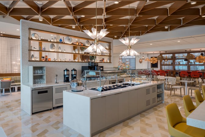 The Escape Lounge at Fort Lauderdale Hollywood International Airport features a self-serve food station with hot and cold options.