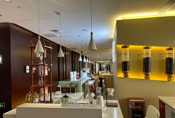 The China Southern Skypearl Lounge at Guangzhou Baiyun Airport features a coffee station with brewing equipment and self-serve options.