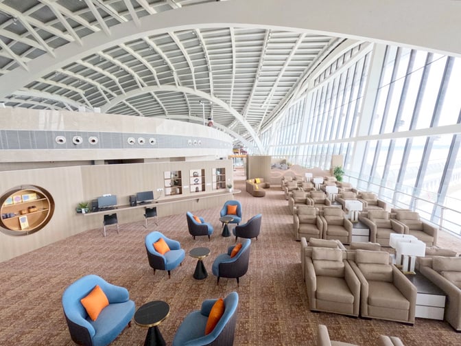 The First Class/Business Class Lounge at Guilin Liangjiang International Airport features spacious seating areas with armchairs and small tables.