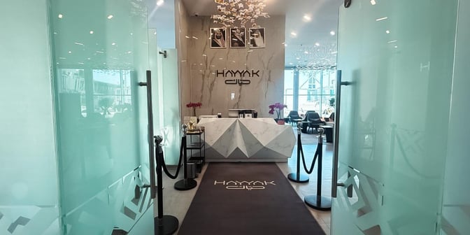 The entrance to the Hayyak Lounge at Arar Domestic Airport features a reception desk with seating visible in the background.