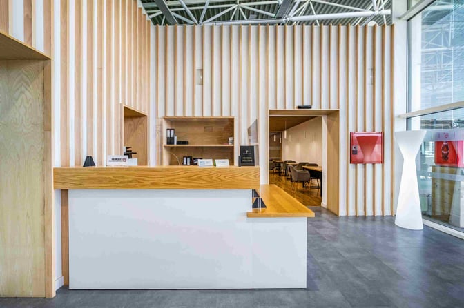 The Jable VIP Lounge at Fuerteventura Airport features a reception desk with adjacent seating area for travelers.