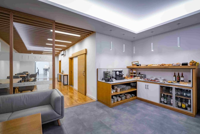 The Jable VIP Lounge at Fuerteventura Airport features a self-serve food and beverage area with coffee machines and snacks.
