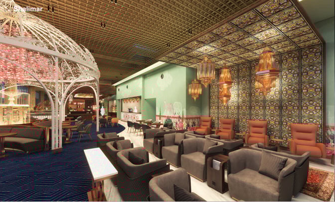 The 080 VIP International Lounge at Kempegowda Airport features a seating area with armchairs and tables, offering a comfortable waiting space.