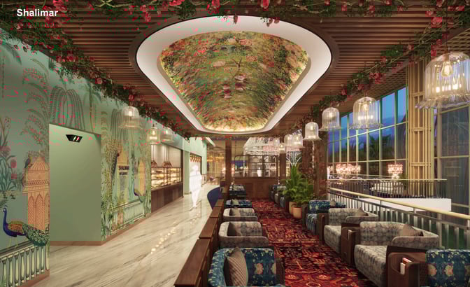 The 080 VIP International Lounge at Kempegowda International Airport features a seating area with armchairs and decorative ceiling elements.