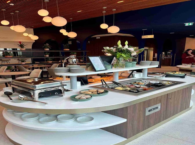 The VIP Lounge at Marseille Provence Airport features a self-serve food station with a variety of hot and cold options.