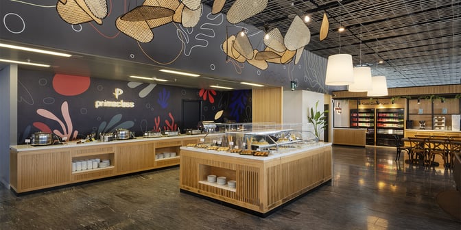 The Primeclass Lounge at Milas–Bodrum Airport features a self-serve food area with hot dishes, pastries, and cold beverages.