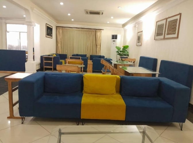 The Safari Comfort Lounge at Moi International Airport features a seating area with sofas and tables for passenger relaxation.