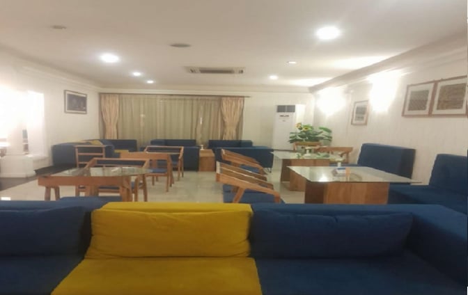 The Safari Comfort Lounge at Moi International Airport features seating with tables, providing a comfortable space for travelers to relax.