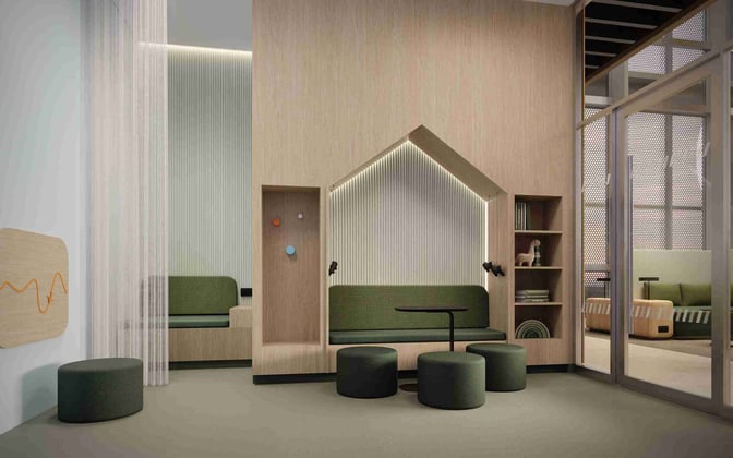 The seating area in Airport Lounge World at Munich Airport features cushioned benches, small tables, and a partitioned play area for children.