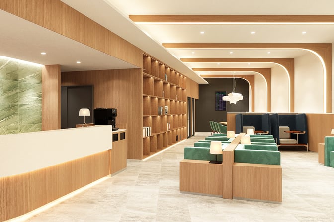 The First Cabin Naha Airport lounge features a reception area with a coffee machine and a seating area with booth and chair options.