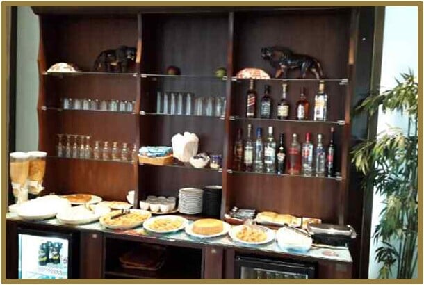 The SDS Lounge at Nnamdi Azikiwe International Airport features a self-serve buffet with a variety of pastries and beverages.