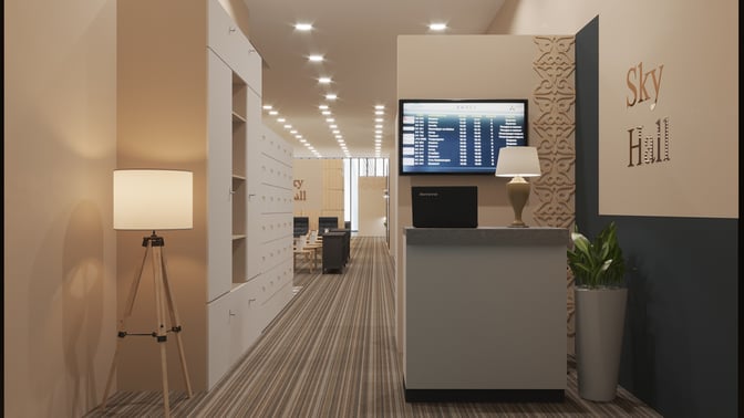 The Sky Hall lounge at Nursultan Nazarbayev International Airport features a reception area with a flight information screen and seating in the background.