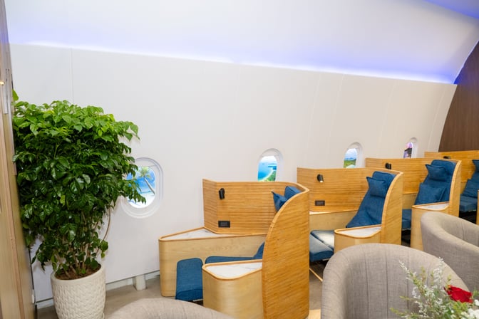 The SH Premium Lounge at Phu Quoc International Airport features semi-private seating pods with individual lighting and power outlets.