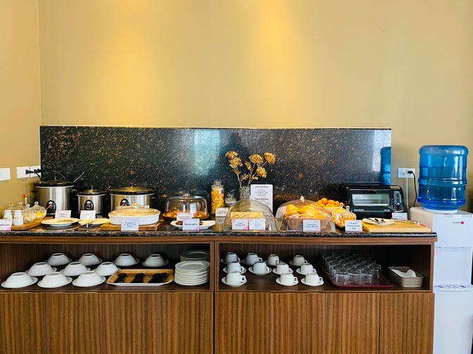 The PAGSS Lounge at Puerto Princesa International Airport offers a self-serve food station with hot dishes, pastries, and beverages.