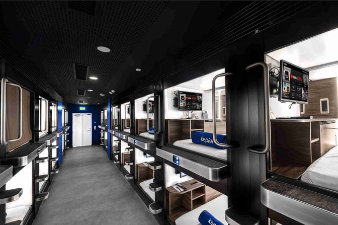 Sleeping pods at Kepler Club in Riga International Airport offer private resting spaces with individual screens and secure access.