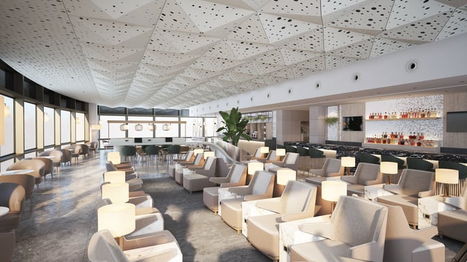The Plaza Premium Bosphorus Lounge at Sabiha Gokcen Airport features a spacious seating area with armchairs and a bar offering various beverages.