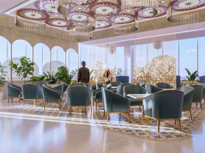 The Adani Lounge at Sardar Vallabhbhai Patel International Airport features a seating area with armchairs and decorative ceiling elements.