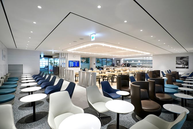 The MATINA Lounge West at Seoul Incheon Airport features a spacious seating area with individual tables and a visible dining section.