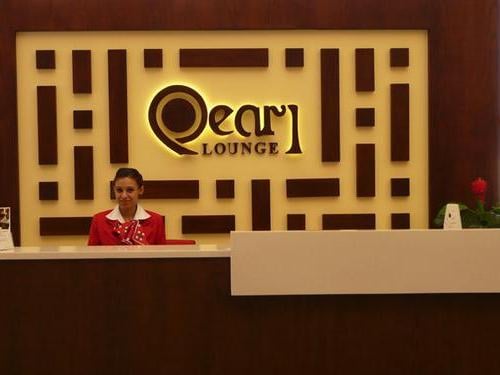 The reception area of Pearl Lounge at Sharm el-Sheikh International Airport features a staffed front desk for guest assistance.