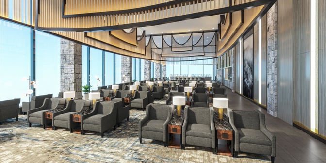 The seating area in the Saphire Plaza Premium Lounge features rows of armchairs with side tables and lamps, offering airport views.