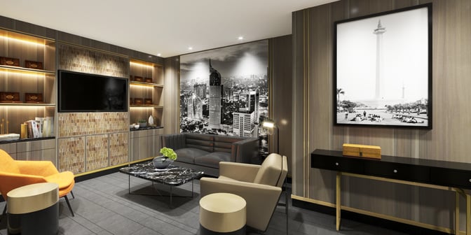 The lounge seating area at Saphire Plaza Premium Lounge features comfortable chairs, a sofa, and a large wall-mounted television.