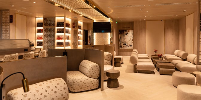 The SH Premium Lounge at Tan Son Nhat International Airport features comfortable seating areas with semi-private booths and workstations.