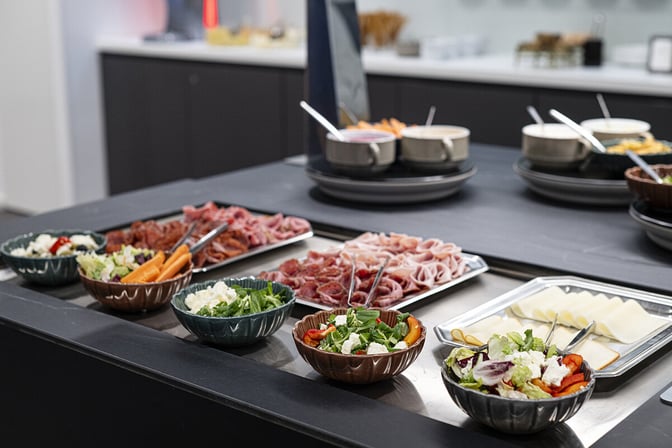 The Fast Track Lounge at Prague Vaclav Havel Airport offers a self-serve buffet with salads, cold cuts, and cheese selections.