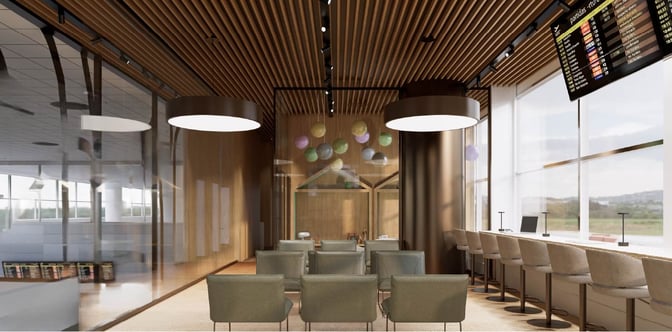 The BRT Lounge at Viracopos–Campinas International Airport features a seating area with armchairs and a counter with barstools overlooking the runway.