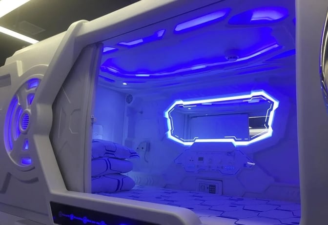 The nap pod at Xi'an Xianyang International Airport offers a private sleeping space with adjustable lighting and control panel features.