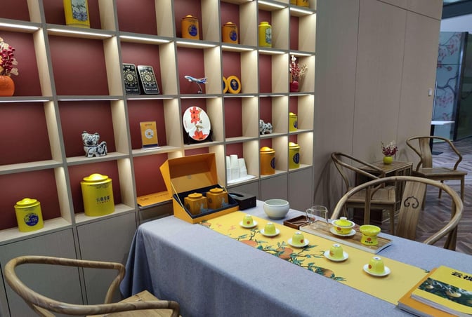 Tea service setup in China Southern Pearl Lounge at Xi'an Xianyang International Airport features traditional teaware and decorative shelving.