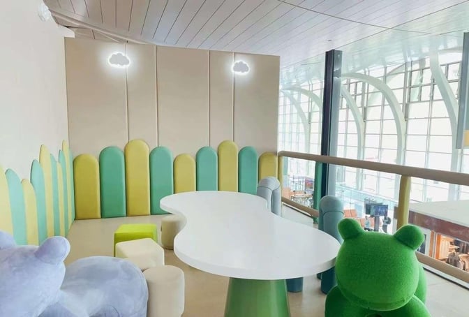 Children's play area in Yinchuan Hedong International Airport's First Class Lounge features animal-shaped seating and a uniquely shaped table.